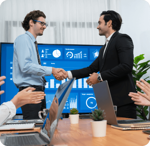 two businessman shake hand meeting room